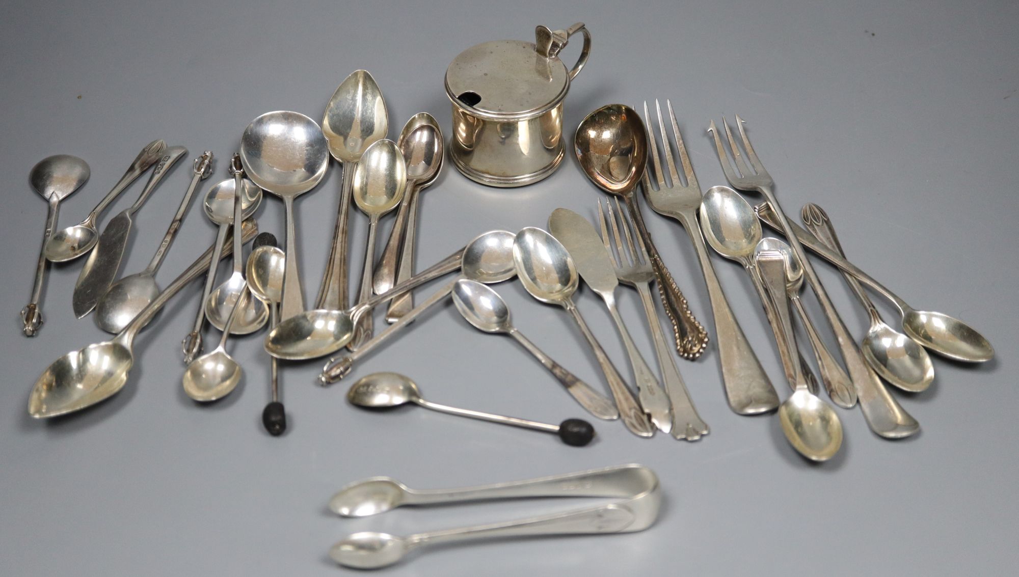 A silver mustard and a quantity of assorted small silver cutlery, gross 16.5 oz.